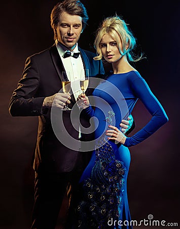 Portrait of an elegant couple with a champagne Stock Photo