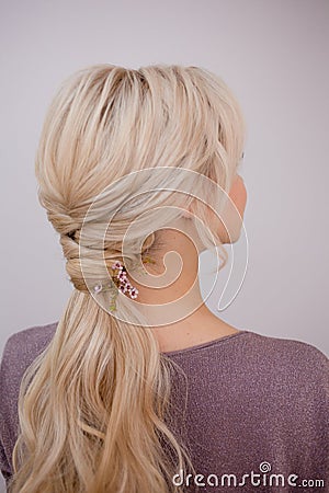 Portrait of an elegant young woman with blond hair. Trendy hairstyle Stock Photo