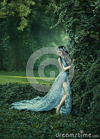 Portrait of an elf in a blooming garde Stock Photo