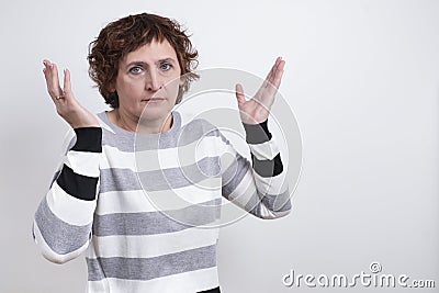 Portrait of emotional, age woman on white background, space for text. Stock Photo