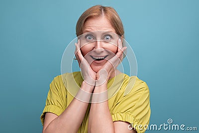 portrait of energetic healthy middle aged blond woman with t-shirt Stock Photo