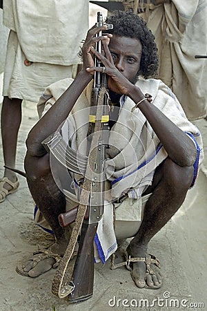 Portrait of Ethiopian Afar man with Kalashnikov Editorial Stock Photo