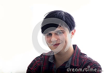 Portrait of a European young man, 21 years old, against a white background Stock Photo