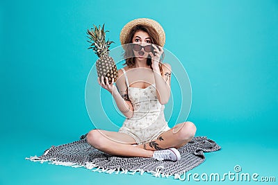 Portrait of a an excited summer girl in beach hat Stock Photo