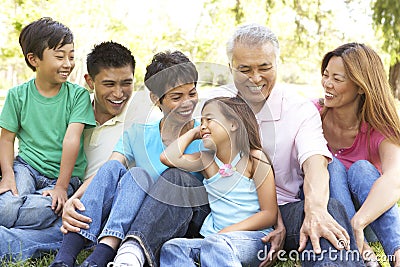 Portrait Of Extended Family Group In Park Stock Photo