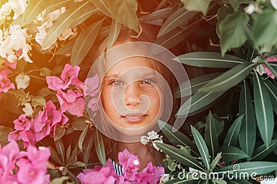 portrait face of candid beautiful little kid girl of eight years old with brown eyes on Stock Photo