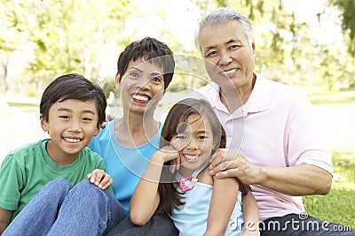 Portrait Of Family In Park Stock Photo