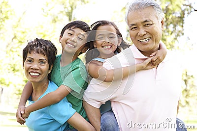 Portrait Of Family In Park Stock Photo