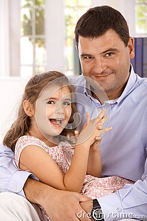 Portrait of father and daughter smiling Stock Photo