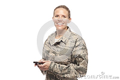 Portrait of female airman with mobile phone Stock Photo