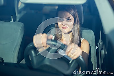 Portrait of female caucasian driver in car Stock Photo