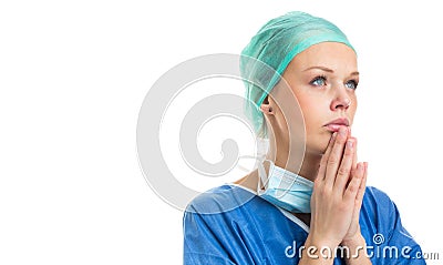 Portrait of a female doctor feeling down, exhausted, frustrated, very tired Stock Photo