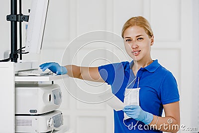 Doctor Using ultrasonic machine Stock Photo