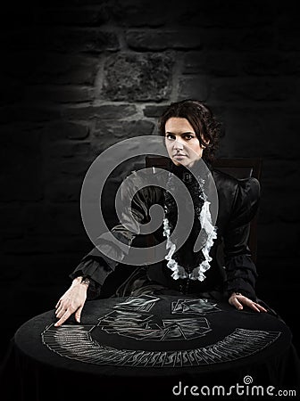 Portrait of a female fortuneteller with the cards Stock Photo