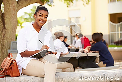 Portrait Of Female High School Student Wearing Uniform Stock Photo