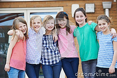 Portrait Of Female Pupils In School Playground Stock Photo