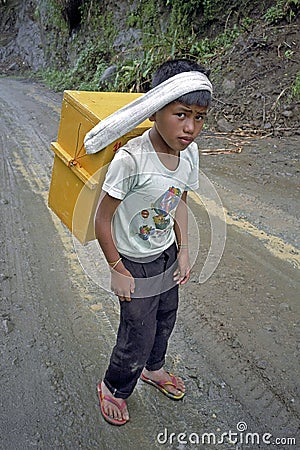 Portrait of Filipino young boy, ice vendor Editorial Stock Photo