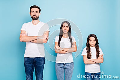 Portrait of focused three entrepreneurs ready to solve work company problems real executives wear white t-shirt denim Stock Photo