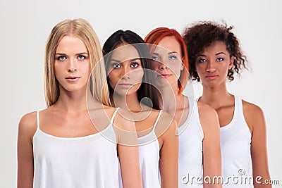 Portrait of a four serious multi ethnic women Stock Photo