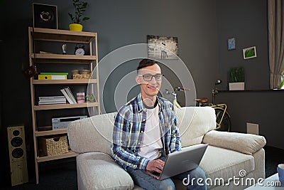 Portrait of freelancer male remotely working at home. Stock Photo