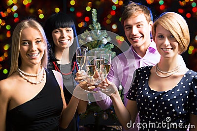 Portrait of friends celebrating New Year Stock Photo
