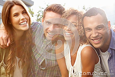 Portrait Of Friends Relaxing Together Outdoors Stock Photo