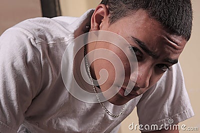 Portrait of frowning teenager Stock Photo