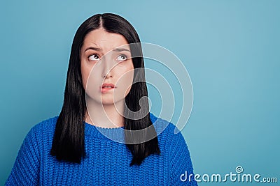 Portrait of frustrated fear girl look copyspace bite lips teeth wear stylish trendy sweater isolated over violet color Stock Photo