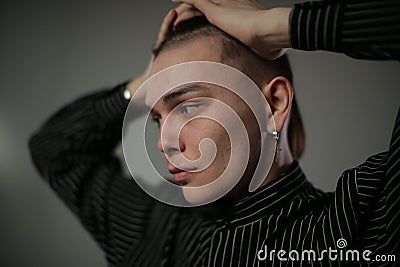 Portrait of a frustrated young man in a semi profile Stock Photo