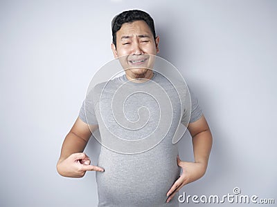 Funny Fat Asian Man Stock Photo