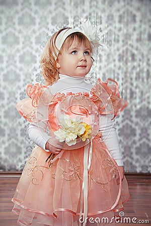 Portrait of funny lovely little girl at interior Stock Photo