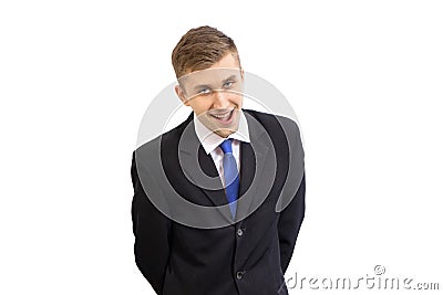 Portrait of funny young attractive business man in a dark suit and a bright blue tie, isolated on white Stock Photo