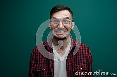 Portrait of a funny young interested man Stock Photo