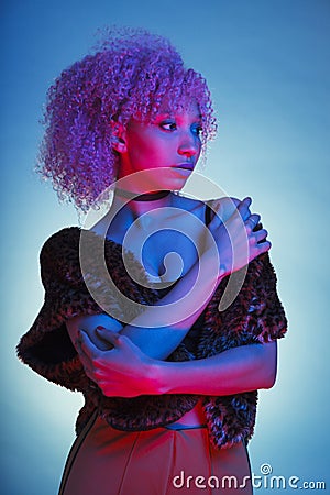 Portrait of a futuristic woman with electronic neon lights Stock Photo