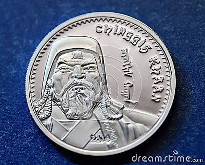 The portrait of genghis khan on a mongolian silver coin Stock Photo