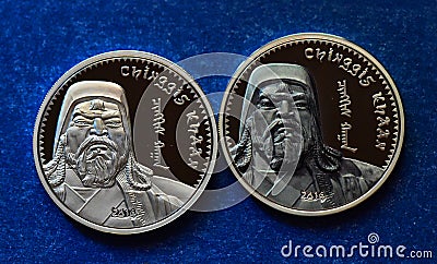 The portrait of genghis khan on a mongolian silver coin Stock Photo