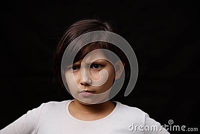 Portrait of a girl on a black background. Stock Photo