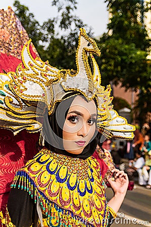 Portrait of a girl with fantasy costume at West Java Folk Arts Festival. Editorial Stock Photo