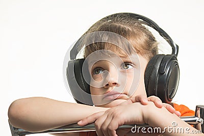 Portrait of girl in headphones listening to music musically Stock Photo