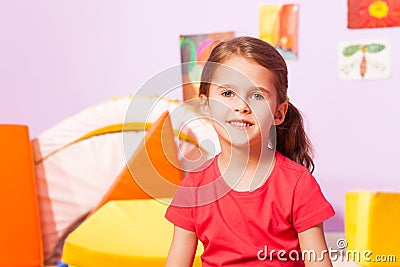 Portrait of girl in kindergarten room Stock Photo