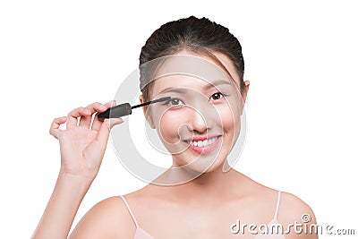 Portrait of a girl with a make-up brush for lash in hands isolated on white Stock Photo