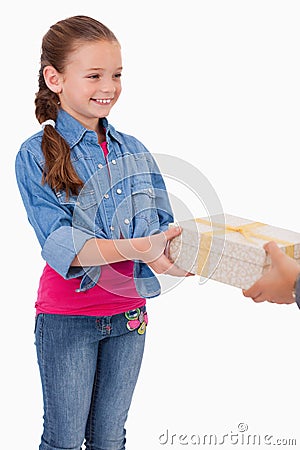 Portrait of a girl receiving a gift Stock Photo