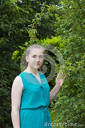 Portrait of girl in summer park Stock Photo