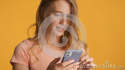 Portrait of girl texting with friend in online chat on smartphon Stock Photo