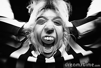 Portrait of a girl with white eyes, she screams on a black background. one of the symbols of halloween Stock Photo