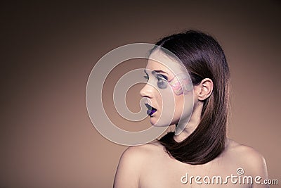 Portrait of girl woman with long straight hair and creative makeup Stock Photo