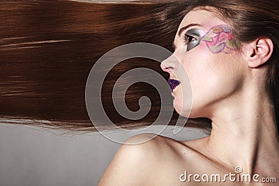 Portrait of girl woman with long straight hair and creative makeup Stock Photo