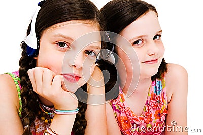 Portrait of girls listening music on headphones Stock Photo
