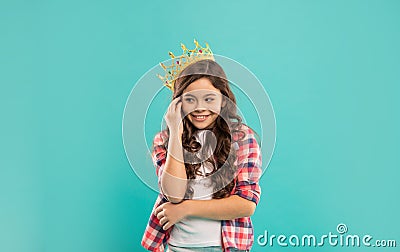 portrait of glory. smiling child in crown. self confident queen. expressing smug. Stock Photo