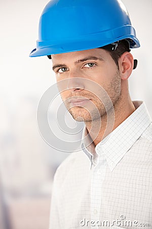 Portrait of goodlooking young man in helmet Stock Photo